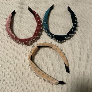 Three velvet knotted headbands